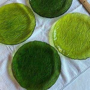 4 shades of green dessert plates. Some color chipped off, shown in photos